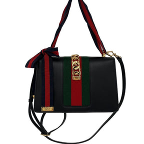 Gucci Sylvie Small Shoulder Bag, black leather with gold chain detail, red and green nylon web detail, black leather adjustable and removable shoulder strap, grosgrain ribbon shoulder strap. Excellent new condition