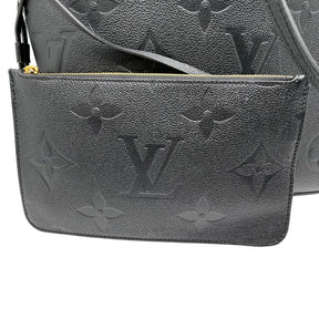 Louis Vuitton Black Empreinte Leather Monogram Neverfull with interior pouch and pocket. Great condition with minor scuffs on back