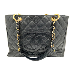Front view: Quilted Caviar Leather in Black. Prominent Quilted Chanel CC Logo. Threaded Gold Chain-Link Shoulder Straps. 