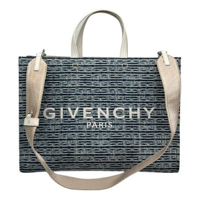 Givenchy Medium G Tote shopping bag in 4G bleached denim, Bleached Denim Exterior, Embossed 4G Pattern, White Embroidered Givenchy Paris Signature, Open Top, One Interior Pocket, Detachable Adjustable Strap, Silver Metal Hardware, Leather Handles, condition excellent