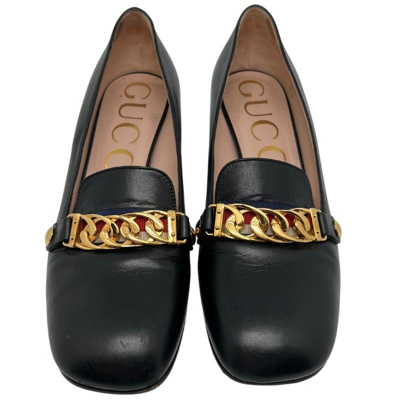 Gucci Sylvie Web Chain Mid Heel Loafers, Black Calfskin Leather, Blue, Red, and White Gucci Web Across the Front, Gold Chain Link Over Web, Size: 39. Condition: Excellent.