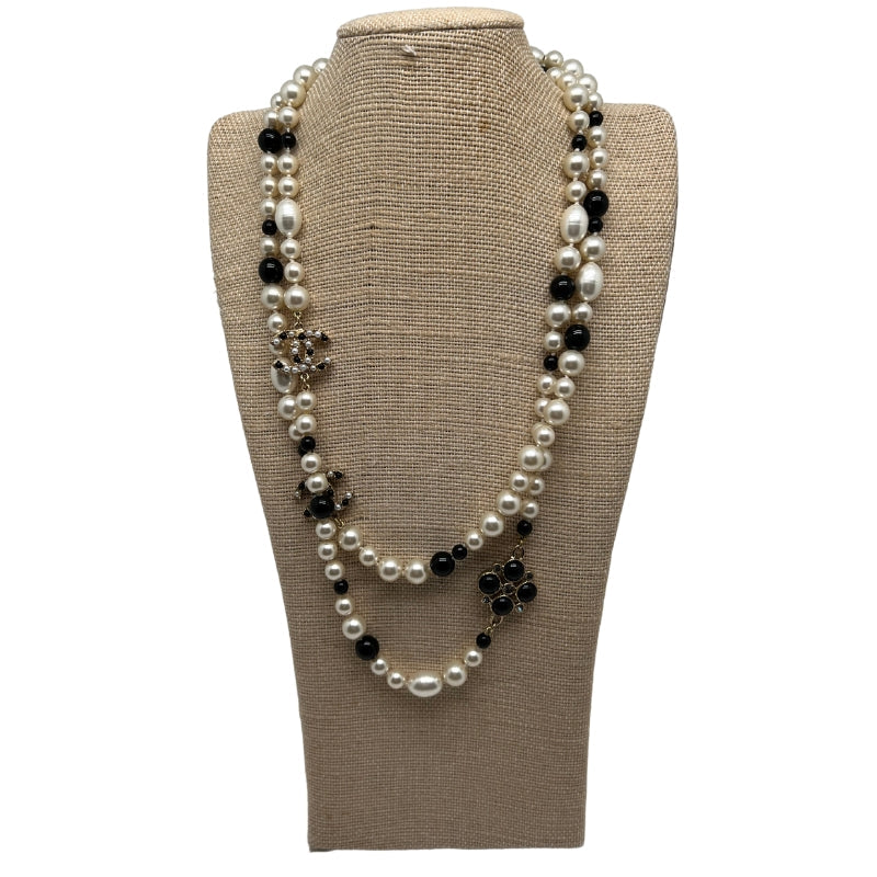 Front View: Pearl-Like Look Beads, Black Beads, Chanel CC Logo Crystal Detail, Silver-Tone Hardware. 