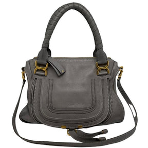 Chloe leather marcie bag, grey soft leather exterior, rolled dual handles, detachable shoulder strap, gold hardware, top zip closure, flap front closure with tassel, dual interior pockets, condition excellent, front view