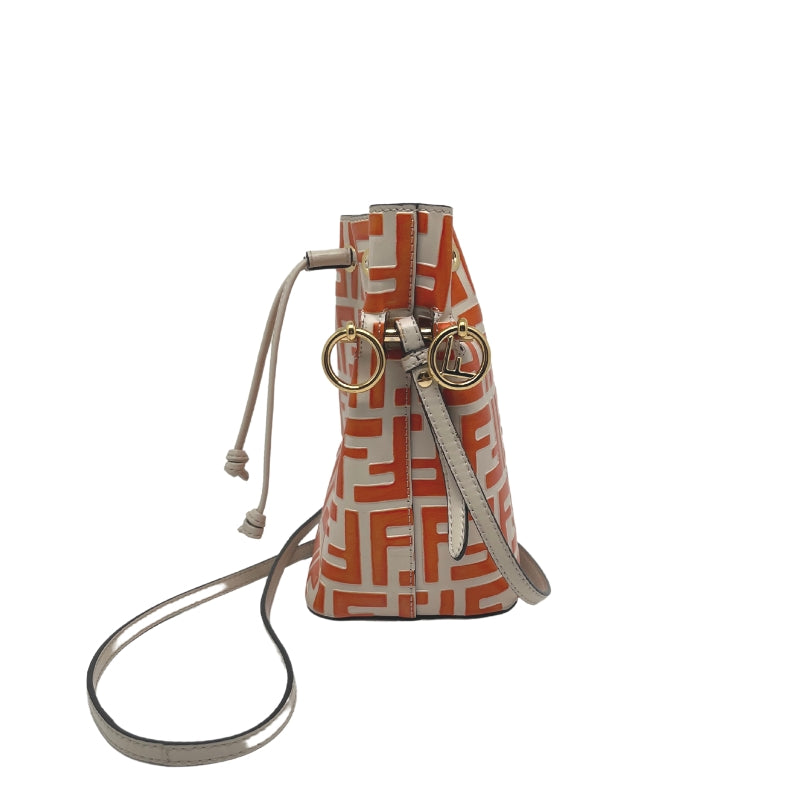 Fendi Embossed Zucca Mini Mon Tresor Bucket Bag, Tan and Red Calfskin Exterior, Zucca FF Logo, Silver Tone Hardware, Handle & Single Shoulder Strap, Alcantara Lining, Drawstring Closure at Top, Dust Bag Included, Condition: Good, Minor Scratching Pictured Above