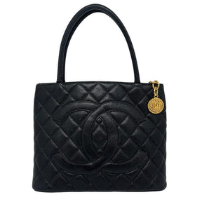 Chanel Caviar Medallion Tote, Quilted Leather Exterior, Gold Tone Hardware, Rolled Handles, Chain Link Accents, Single Exterior Pocket, Leather Lining, Dual Interior Pockets, Zip Closure at Top, Condition: Excellent
