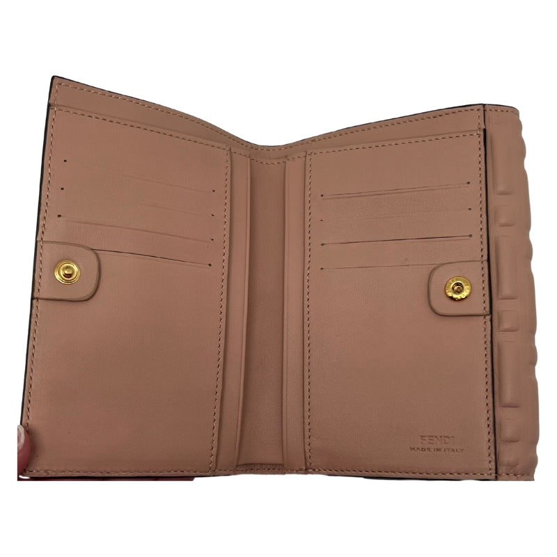 Interior: Bill Compartment, Eight Cardholder Slots, Gold-toned Hardware. 