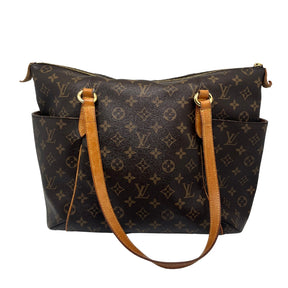 Louis Vuitton Monogram Totally MM Tote, Brown Coated Canvas Exterior, Brass Hardware, Dual Shoulder Straps, Leather Trim Embellishment, Dual Exterior Pockets, Canvas Lining, Three Interior Pockets, Zip Closure at Top, Condition: Excellent