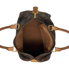 Louis Vuitton logo speedy 30, brown monogram coated canvas exterior, rolled handles, top zipper closure, canvas lining, single interior pocket, brass hardware, condition good, top view