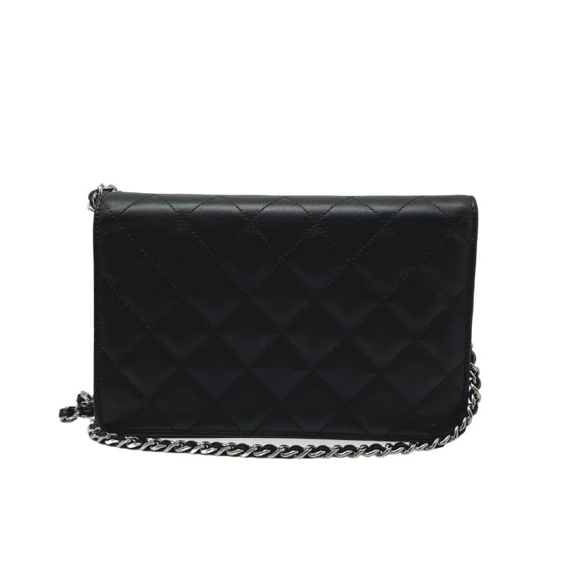 Chanel ligne cambon wallet on chain, quilted black leather exterior, patent CC logo detail, silver hardware, chain shoulder strap, snap closure at front, hot pink cc logo lining, dual interior pockets with card slots, condition excellent, back view
