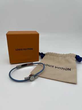Louis Vuitton Space Bracelet | Palladium-Plated & Brass | Light Blue Cord | Adjustable | Excellent Condition | Box & Jewelry Pouch Included