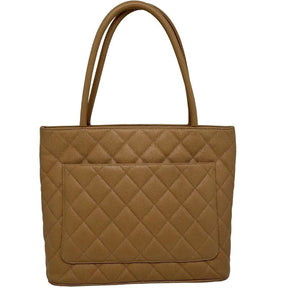 Chanel Medallion Tote with brown quilted leather, interlocking CC logo, single exterior pocket, leather lining & dual interior pockets. Excellent condition