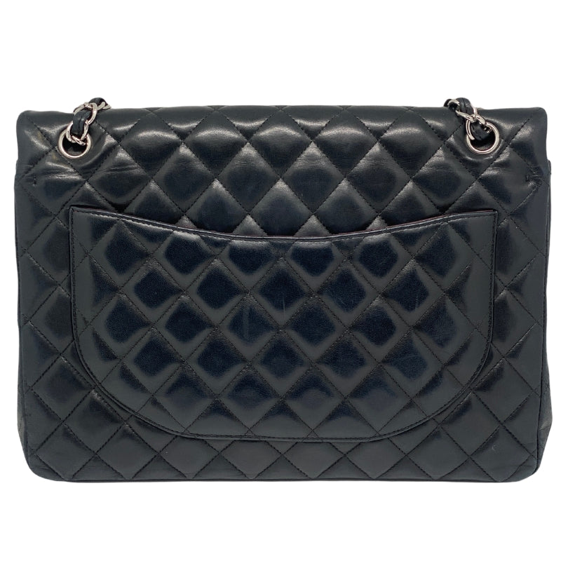 Chanel Lambskin Quilted Classic Maxi Flap Bag Back Black Lambskin Flat Exterior Pocket