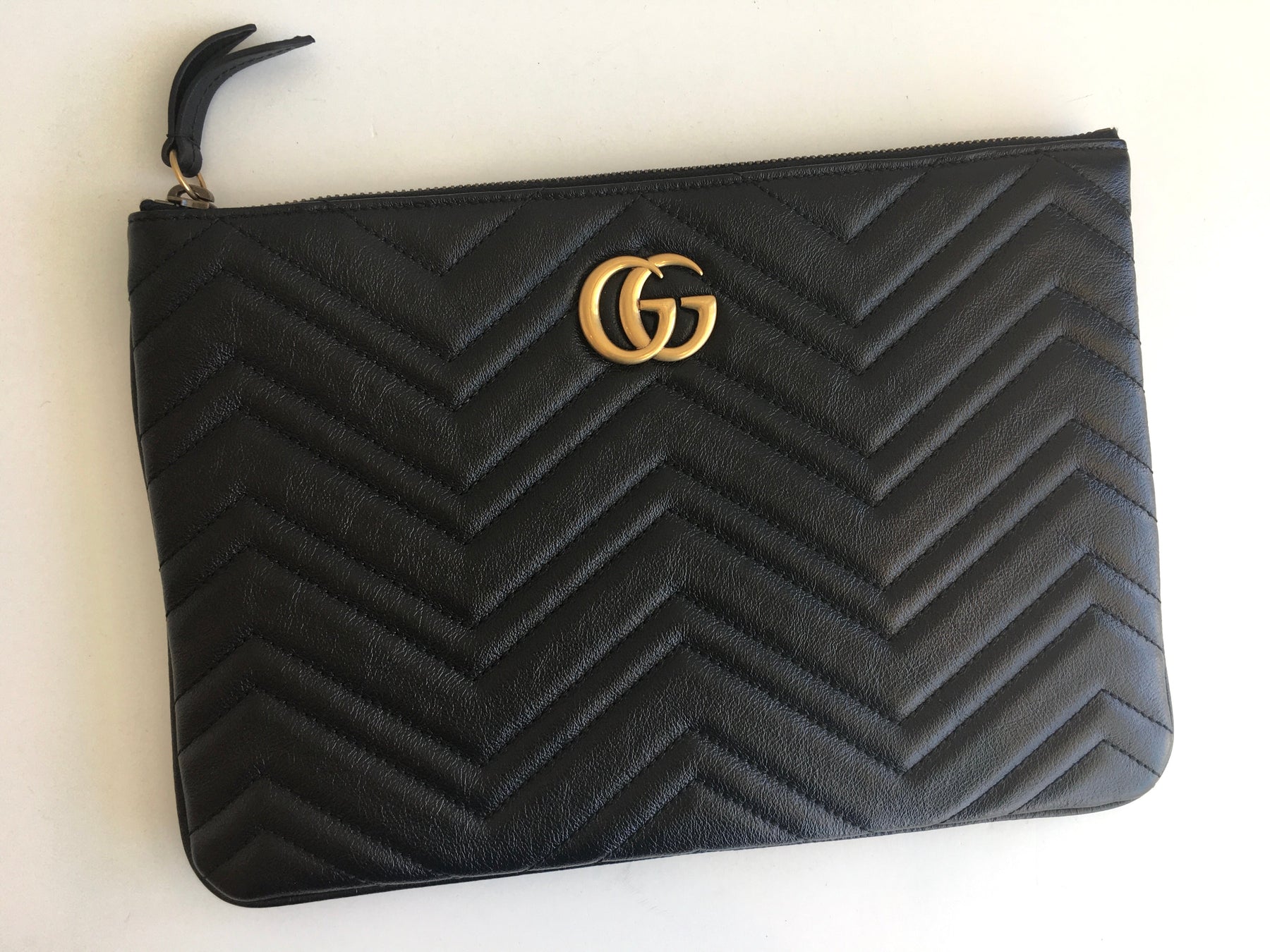Gucci GG Marmont Quilted Leather Pouch Aged Gold GG Logo