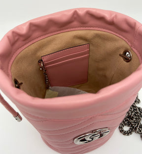 Pink Leather Gucci Marmont Matelassé Bucket Bag | Silver-Tone Hardware | Chain Link Shoulder Strap | Suede Lining | Leather Card Slots | Drawstring Closure | Box & Dust Bag Included | Excellent Condition