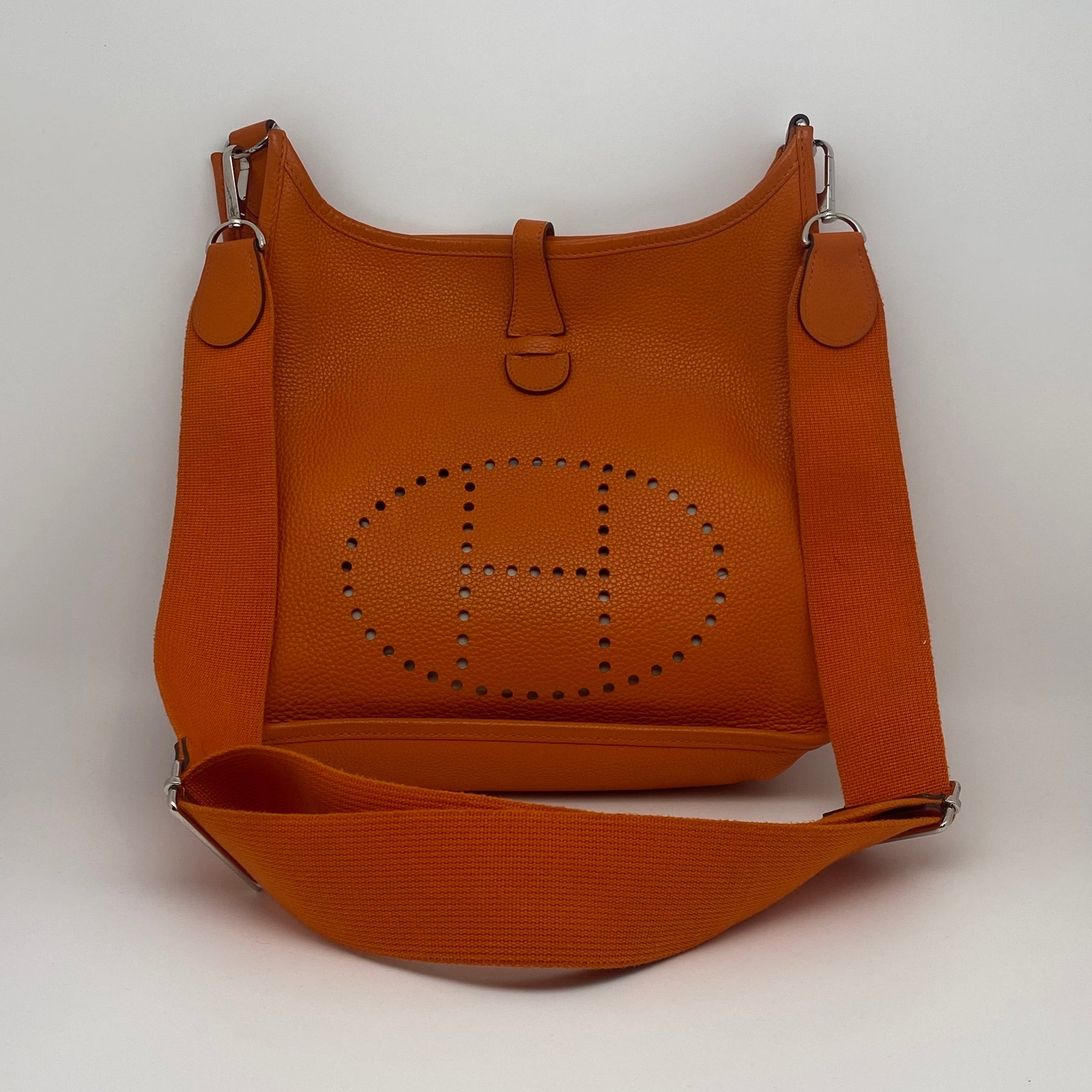 Hermès Evelyne III Generation Clemence PM Front Perforated H Logo Orange Leather Palladium Hardware Adjustable Detachable Single Strap