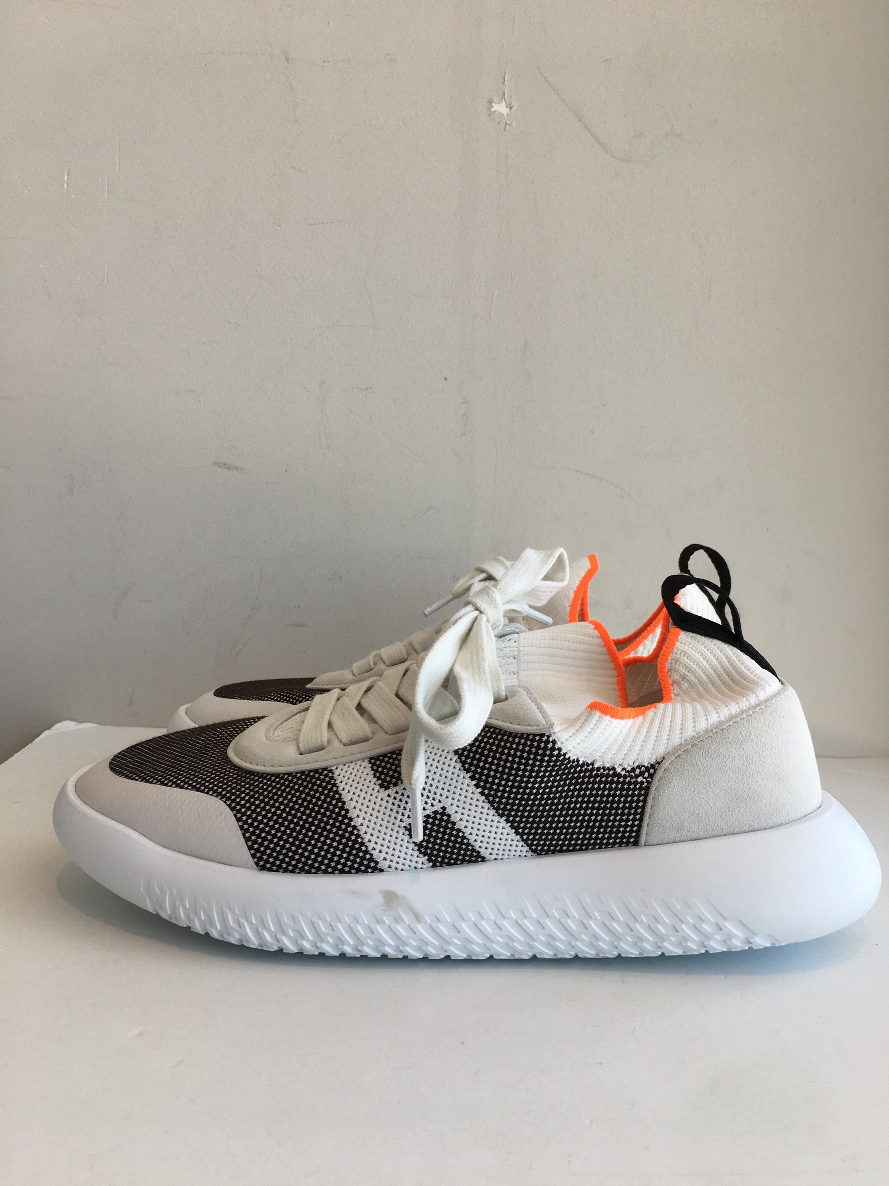 Hermès Crew Running Sneakers in White and Orange Side