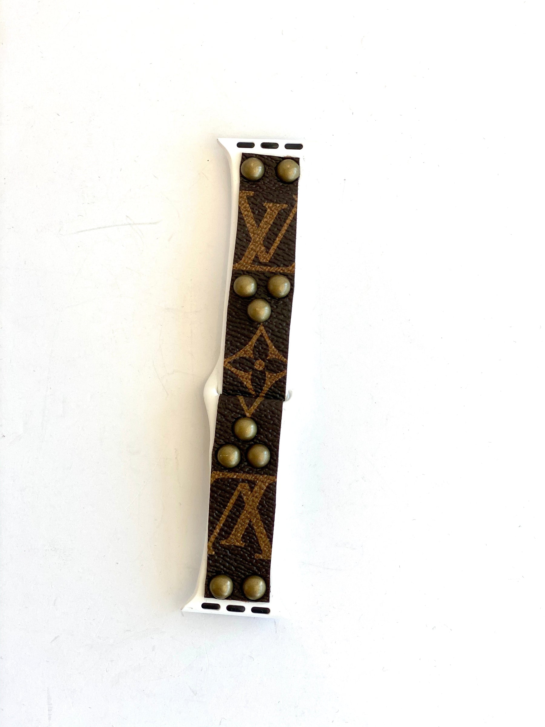 white and brown watch band