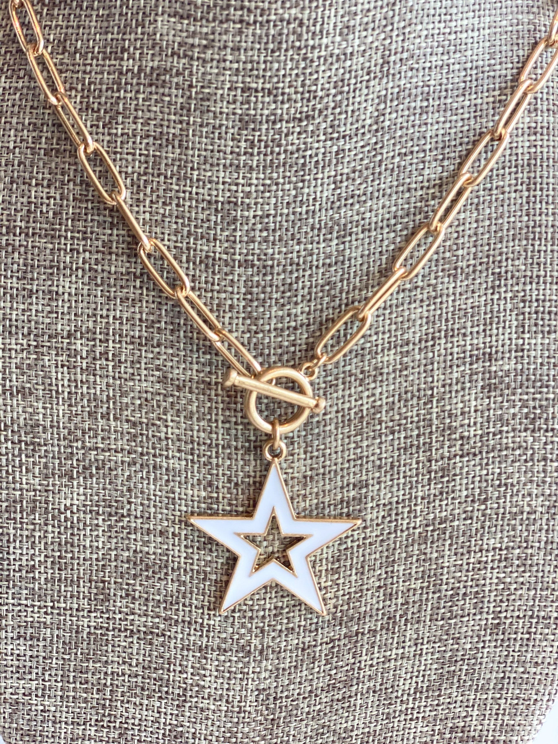 small white star interlock necklace