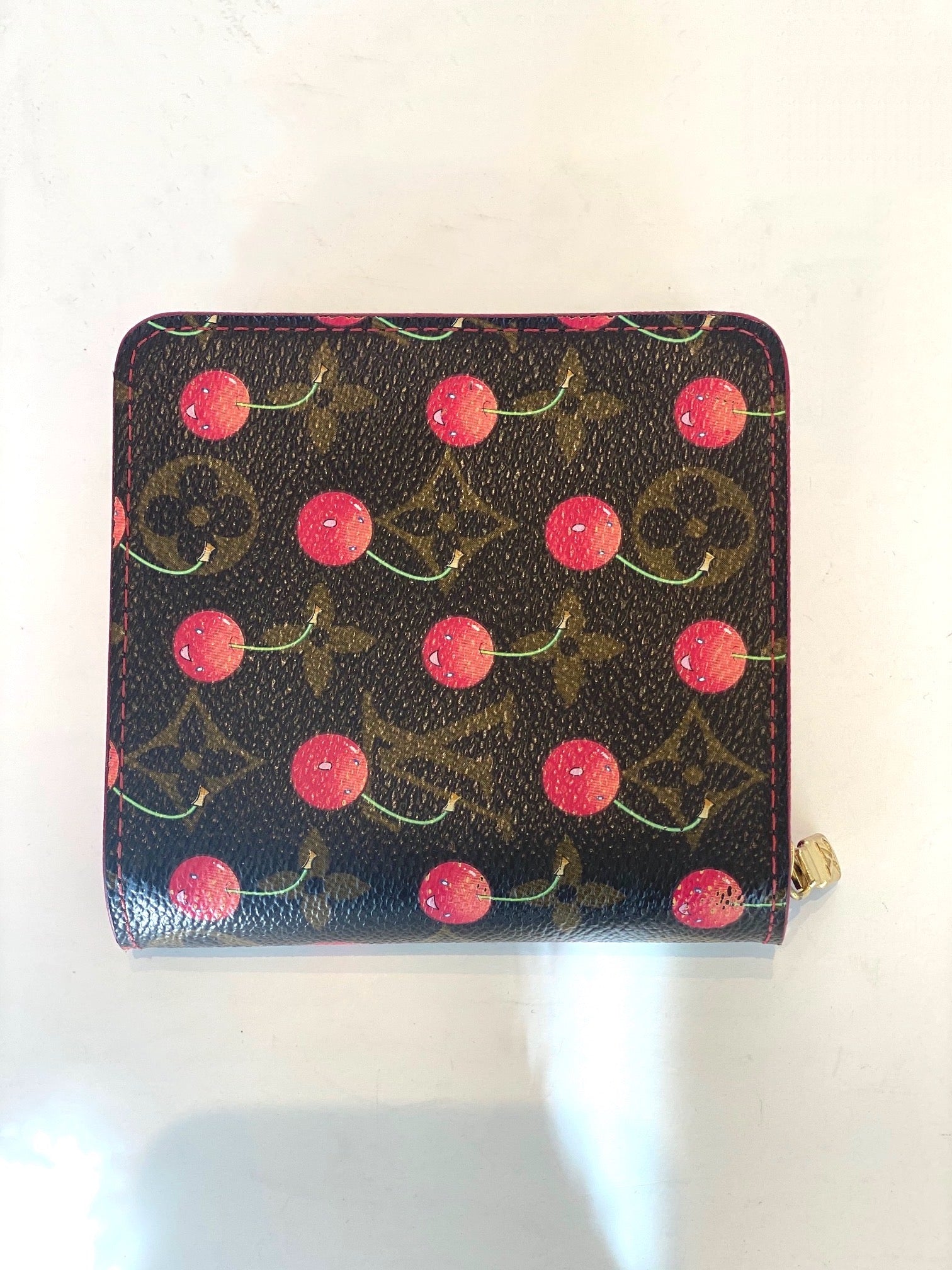 back of LV cherry wallet