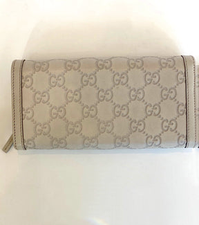back of gucci monogram wallet