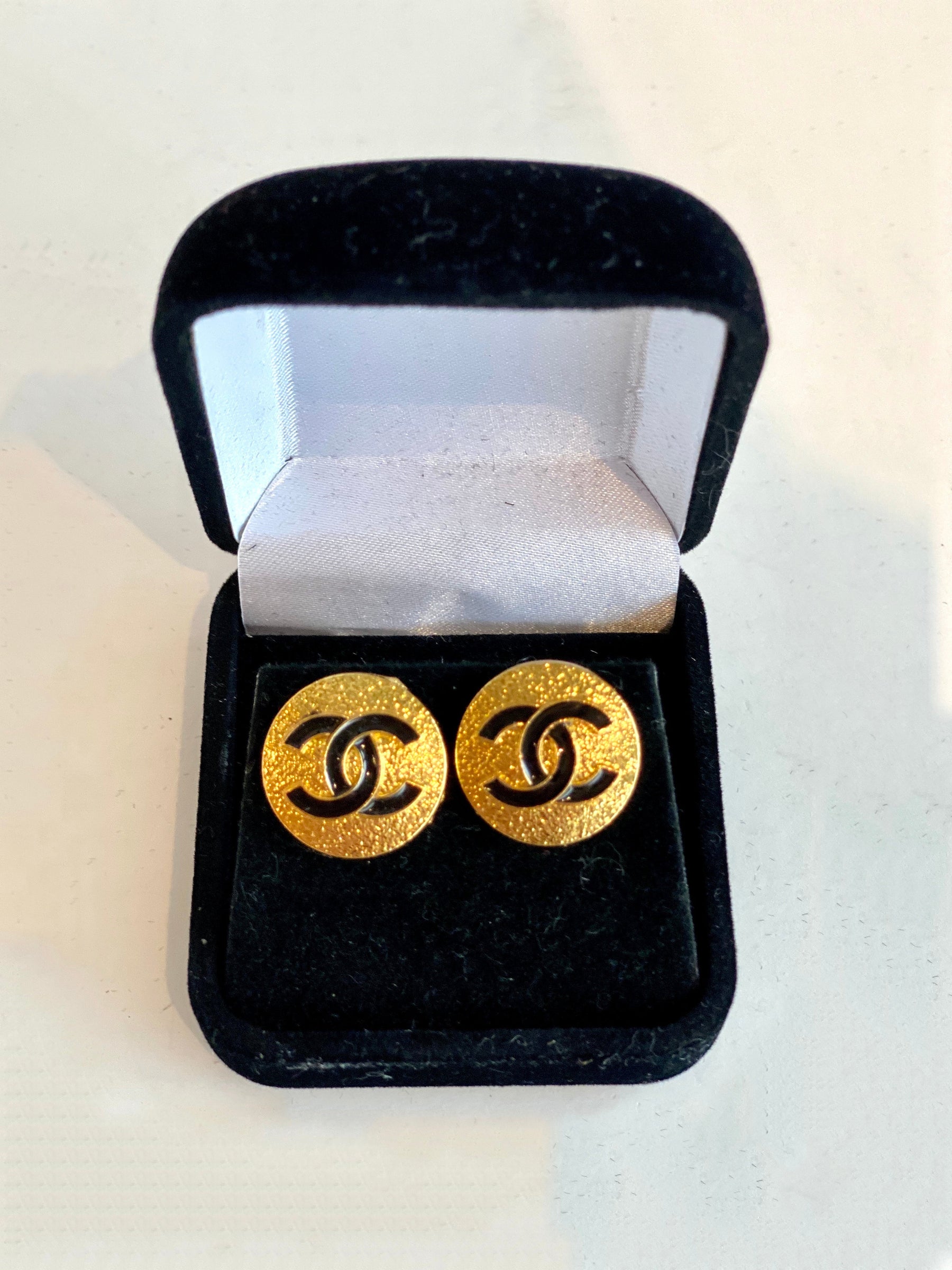 gold designer button earrings