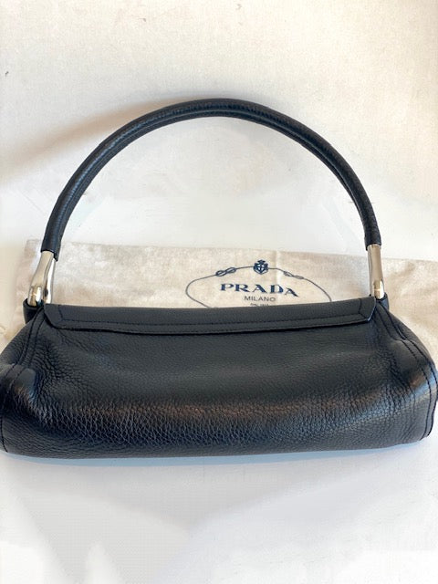 bottom of prada purse