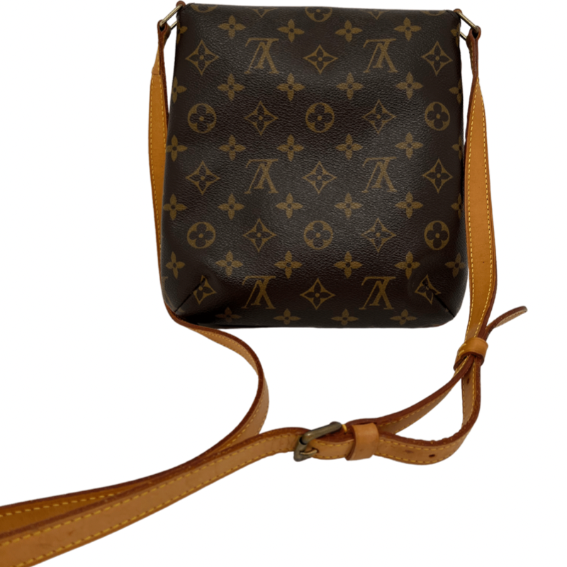 Louis Vuitton Monogram Musette Salsa with brown leather lining, brass hardware, adjustable shoulder strap, single interior pocket, flap & snap closure. Good condition with some signs of wear