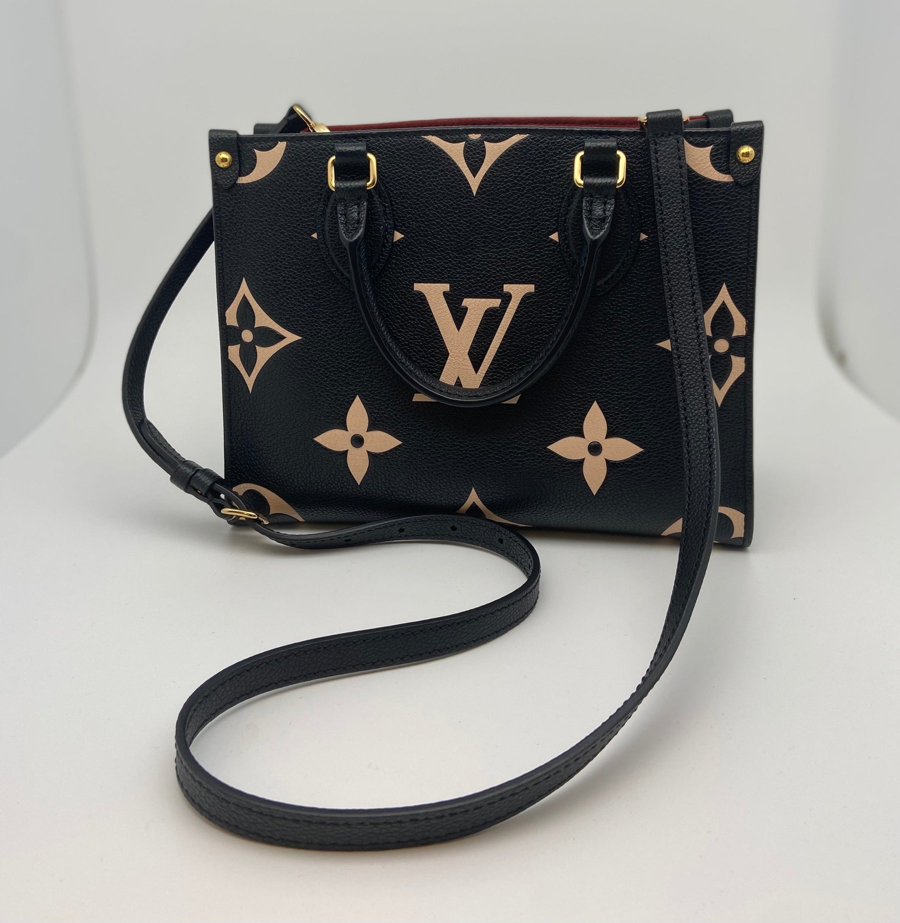 Louis Vuitton On the Go PM Tote - dress. Raleigh