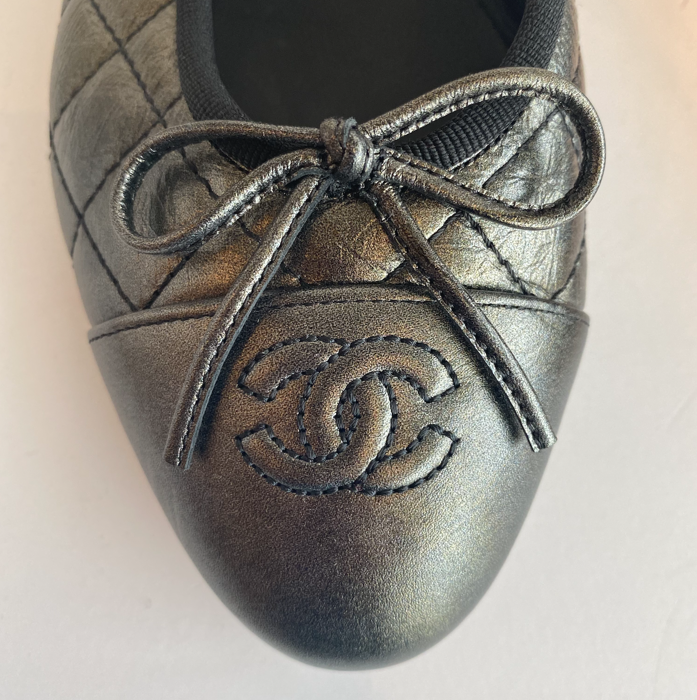 Chanel Quilted Ballet Flat in Gunmetal Logo and Bow Detail Round Toe