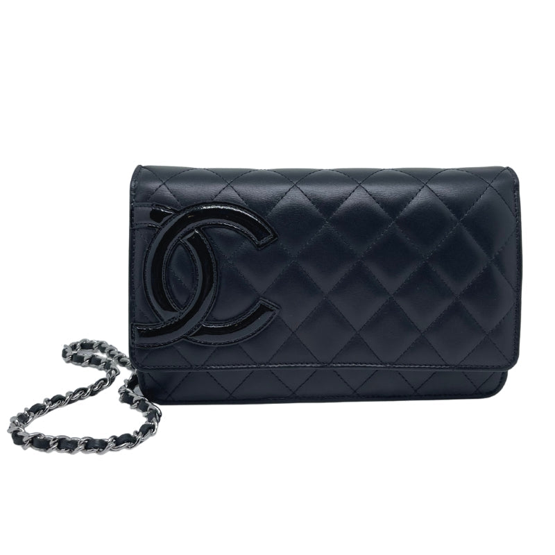 Chanel Calfskin Quilted Cambon Wallet on Chain  Black Calfskin Leather   Black Patent Leather CC Emblem   Silver Tone Hardware  Leather Threaded Chain   Front Snap Closure