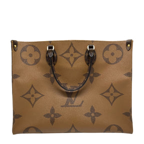 Louis Vuitton OnTheGo GM  Monogram and Monogram Reverse Coated Canvas Exterior   Gold Toned Hardware  Top Handles and Dual Shoulder Straps  Red Fabric Interior  Single Interior Zipper Pocket   Dual Interior Flat Pockets 