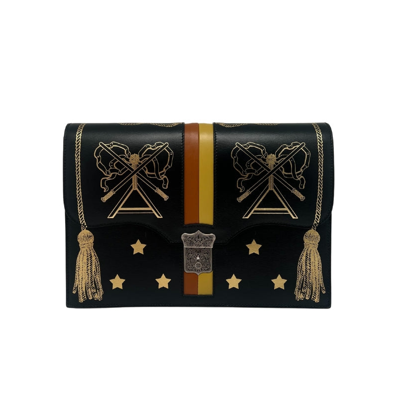 Black Leather Exterior   Gold Star, Tassel, and Sword Motifs  Silver Toned Hardware  Brown and Yellow Stripe Accent  Front Flap Closure with Lock and Matching Key   Black Leather and Fabric Interior   Single Interior Flat Pocket   Accordion Sides   Dust Bag Included  Height: 8.25"  Width: 12"  Depth: 2.50"