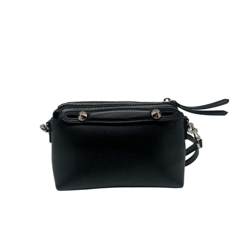 Black Leather Exterior   Silver Toned Hardware   Adjustable Top Handles   Adjustable Leather Strap  Top Zipper   Black Fabric Interior   Single Interior Flat Pocket   Dust Bag Included   Height: 5"  Width: 8.25"  Depth: 3.50"