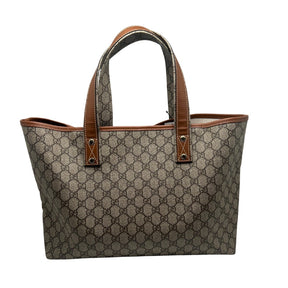 Gucci GG Supreme Tote Bag  Monogram Canvas Exterior   Gold Toned Hardware  Two Exterior Shoulder Straps  Brown Leather Detailing on Exterior   Green and Red Fabric Tag on Exterior    Cream Fabric Interior   Single Interior Pocket with Monogram Canvas Exterior