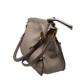 Chloé Marcie Double Carry Bag  Beige Leather Exterior   Gold Toned Hardware  Exterior Front Flap Pocket with OliveGreen Fabric Interior  Brown and Cream Stitching on Exterior   Single Beige Leather Crossbody Strap  Double Beige Leather Shoulder Straps  Single Zip Closure on Exterior  Olive Green Fabric Interior   Single Interior Flat Pocket with Zip Closure   Single Interior Pocket with No Closure