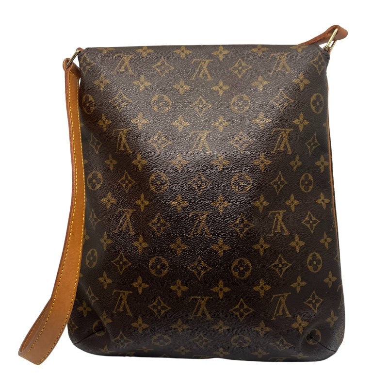 Louis Vuitton Musette Bag  Monogram Canvas Exterior   Gold Toned Hardware   Single Flat Adjustable Crossbody Strap   Fold Over Flap Closure With Brown Canvas Interior   Tan Suede Interior   Two Interior Flat Pockets 