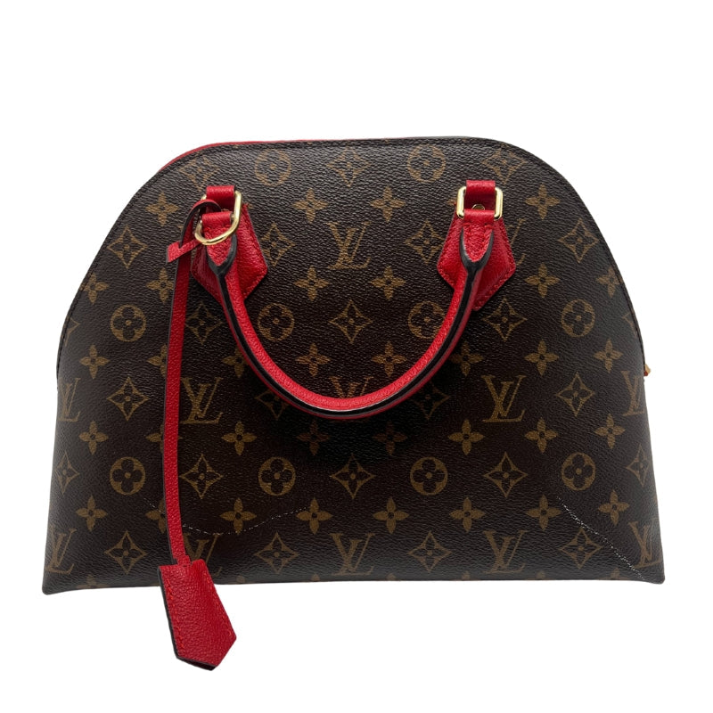 Louis Vuitton BNB Alma Monogram Bag  Monogram Canvas Exterior   Gold Toned Hardware  Double Rounded Red Leather Straps   Removable Flat Red Shoulder Strap  Red Tag Accent on Exterior   Single Zip Closure   Red Leather Exterior Surrounding Zipper   Red Suede Interior   Single Interior Flat Pocket 