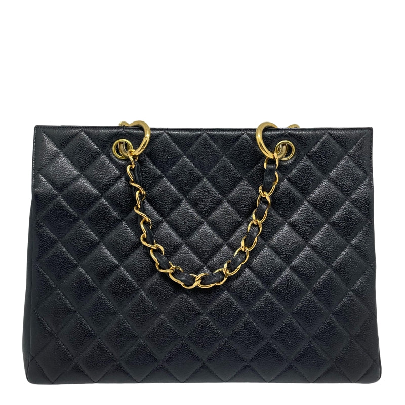Chanel Quilted Caviar Timeless Shopping Tote   Black Diamond Quilted Caviar Leather  Front CC Logo Patch   Gold Toned Hardware  Leather Threaded Chain Link Straps   Gold Toned Protective Feet   Leather Interior   One Interior Flat Pocket  One Interior Zipper Pocket 