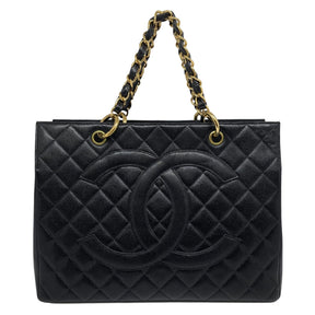 Chanel Quilted Caviar Timeless Shopping Tote   Black Diamond Quilted Caviar Leather  Front CC Logo Patch   Gold Toned Hardware  Leather Threaded Chain Link Straps   Gold Toned Protective Feet   Leather Interior   One Interior Flat Pocket  One Interior Zipper Pocket 
