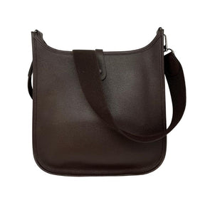 Hermes Clemence Evelyn chocolate brown, leather exterior, single adjustable shoulder strap, suede interior, laser cut H accent, palladium plated hardware, single exterior pocket, snap closure at back, back view