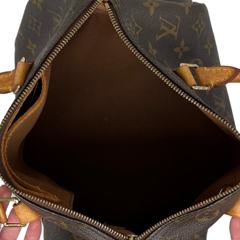 Louis Vuitton logo speedy 30, brown monogram coated canvas exterior, rolled handles, top zipper closure, canvas lining, single interior pocket, brass hardware, condition good, top view