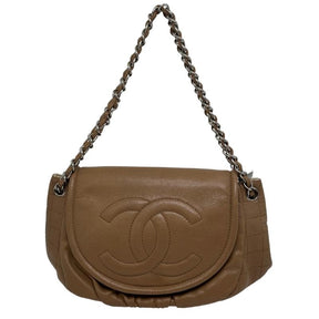 Chanel half moon flap bag, large CC logo stitched on front, brown caviar leather exterior, silver hardware, chain shoulder strap, front snap closure, twill lining, dual interior pockets, condition good, front view