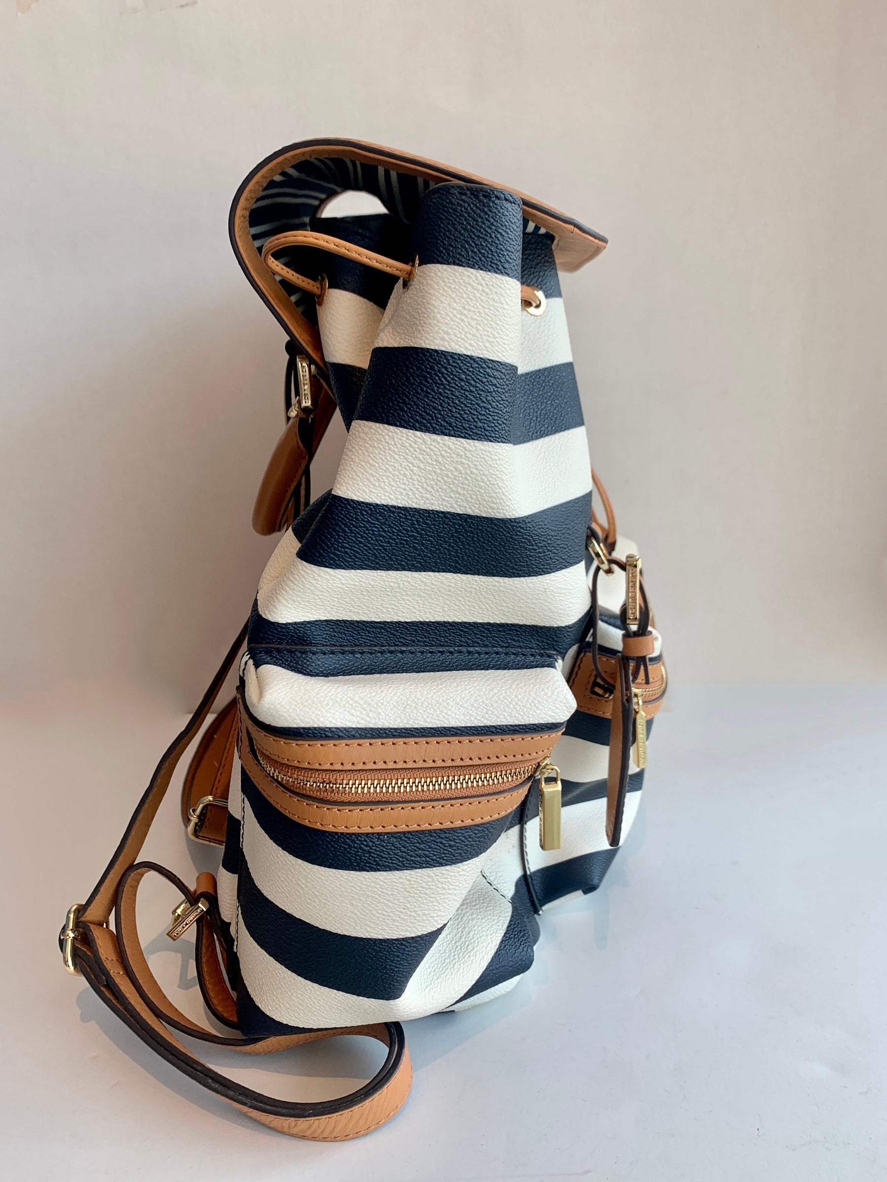 blue and white striped backpack with leather strap Tory Burch Navy Striped Kerrington Backpack