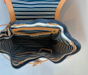 blue and white striped backpack with leather strap Tory Burch Navy Striped Kerrington Backpack
