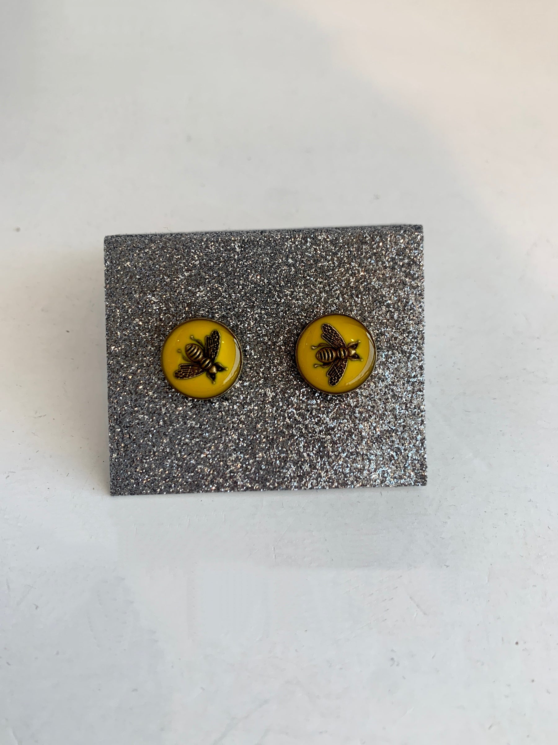 Designer button earrings