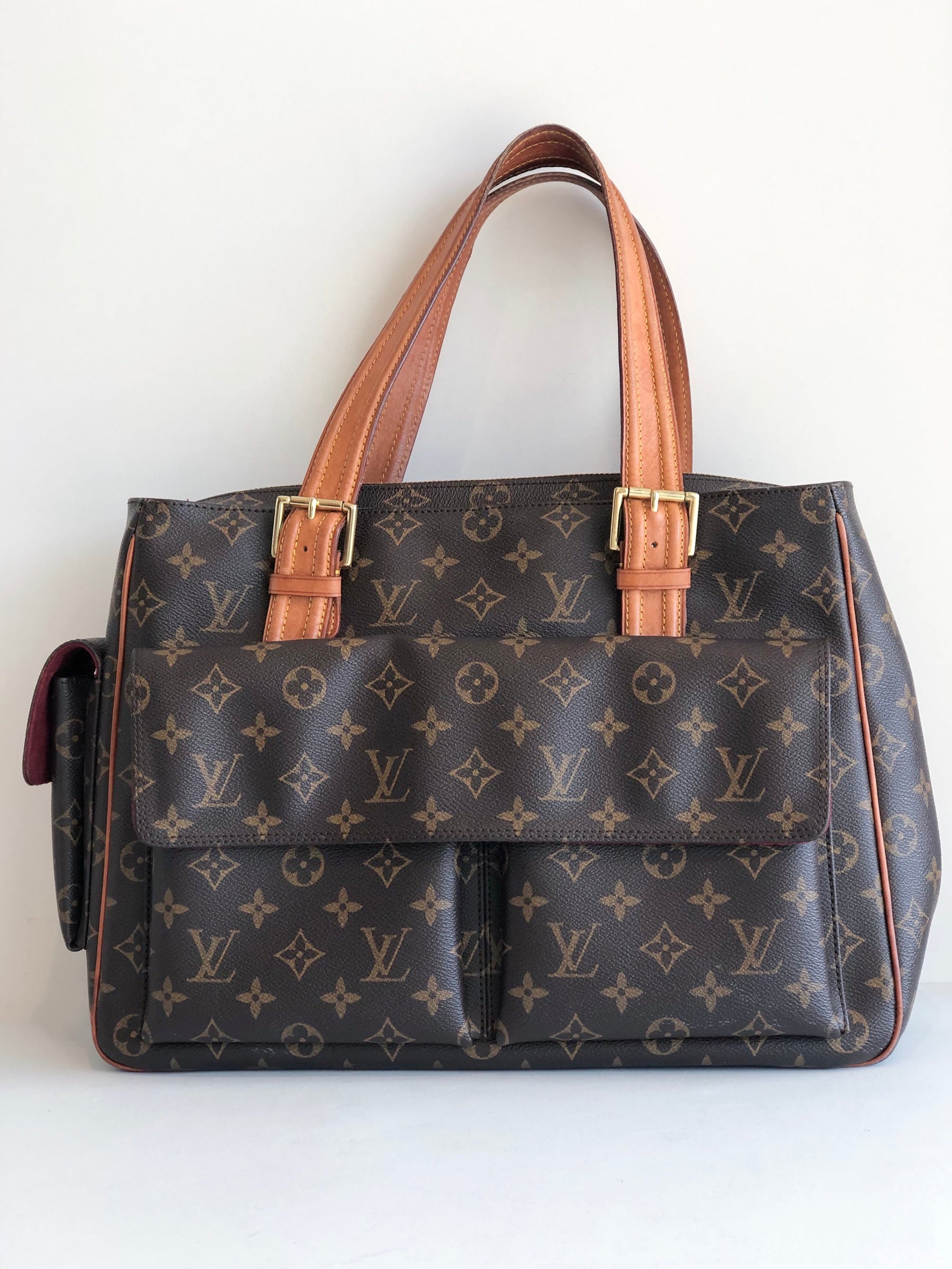 Louis Vuitton Multipli-Cite Bag - Dress Raleigh Consignment