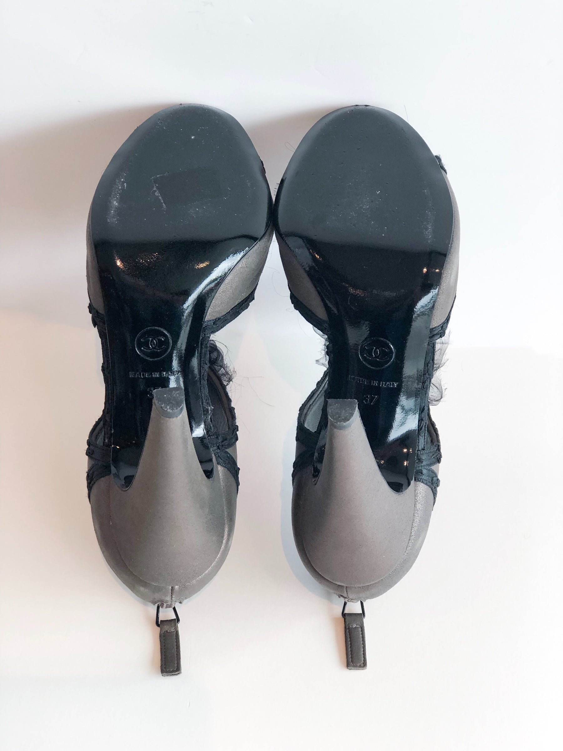 Chanel Gray Heels Pom Pom Bottom of Shoes